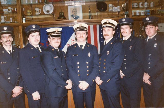 1987 Fire Company Line Officers (L-R): Nick Neglio, 2nd Lieutenant; Bill Kenny, 2nd Captain; Kevin Wertz, 2nd Deputy Chief; Ed R. Mullen, Chief; Tim Weeks, 1st Deputy Chief; Ray Sheaffer, 1st Captain; Mike Mosher, 1st Lieutenant.